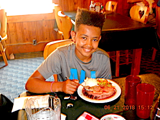 Eli With Audreys Famous Prime Rib at Fireside Lodge in Canada